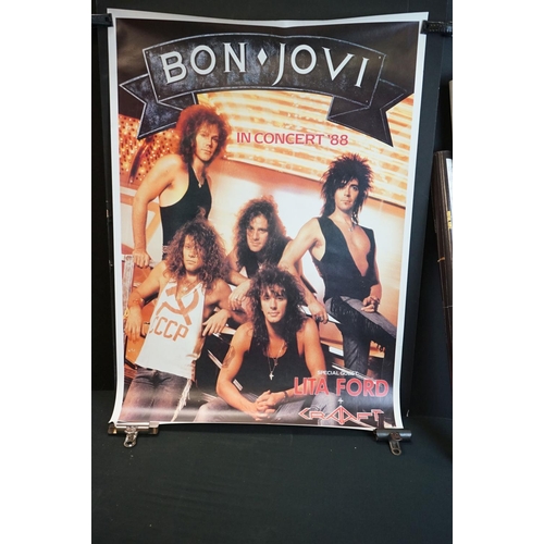 564 - Six rolled posters, to include AC/DC x 2, Bon Jovi, Def Leppard, Jimi Hendrix Total Guitar & Deep Pu... 