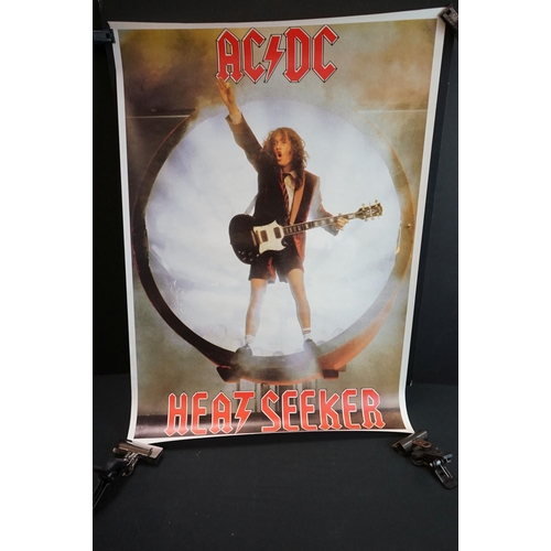 564 - Six rolled posters, to include AC/DC x 2, Bon Jovi, Def Leppard, Jimi Hendrix Total Guitar & Deep Pu... 