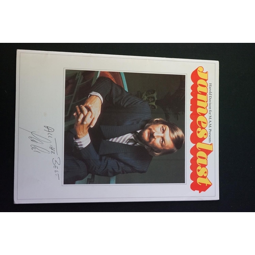 568 - Memorabilia - A Quantity of signed photographs and vinyl, artists include Sherrick, The Hollies (whi... 