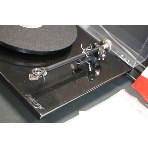 581 - Stereo Equipment - A Rega P3 Turntable along with a Rega Fono Mini. Rega Planar P3/24V fitted with G... 