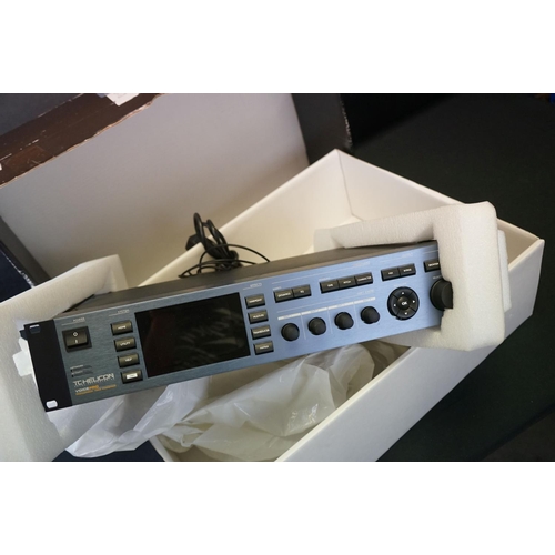 590 - Music Equipment - A boxed TC Helicon VoicePro voice processor effects unit, along with a SPL Gold Mi... 