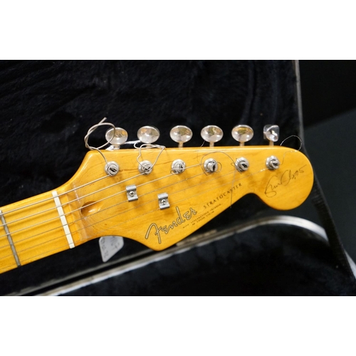 600 - Guitar - A stratocaster style electric guitar with Fender decals to headstock, in a Fender branded h... 