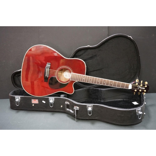 605 - Guitar - Takamine EG-334RC electro acoustic guitar in burgundy finish.  Comes with a Stronghold hard... 