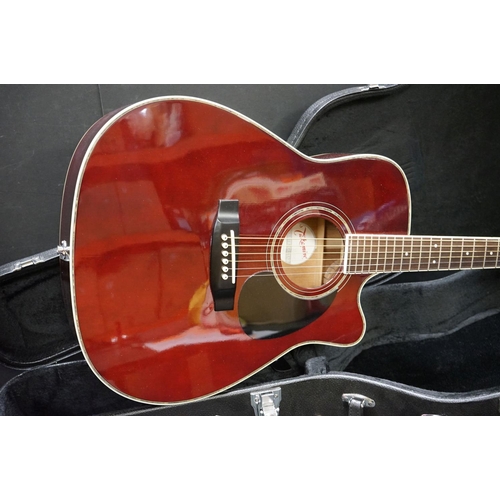 605 - Guitar - Takamine EG-334RC electro acoustic guitar in burgundy finish.  Comes with a Stronghold hard... 