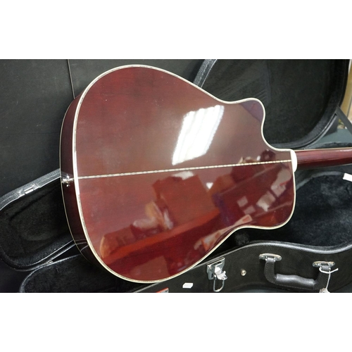 605 - Guitar - Takamine EG-334RC electro acoustic guitar in burgundy finish.  Comes with a Stronghold hard... 