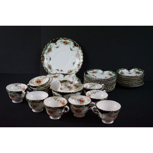 59 - Royal Albert Festoon Crown China Tea Ware to include 9 teacups and saucers, slop bowl, 12 small plat... 