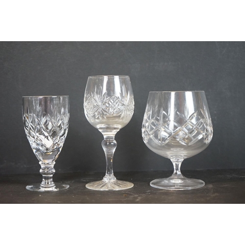 42 - Collection of crystal cut glass to include 2 sets of 6 wine glasses with knop stems, 8 tumblers, 6 w... 