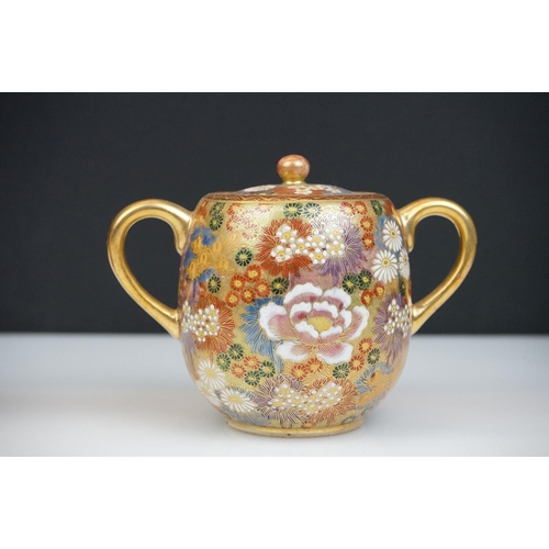 8 - Japanese Satsuma Three Piece Coffee Set decorated with flowers on a gilt ground, marks to base, coff... 