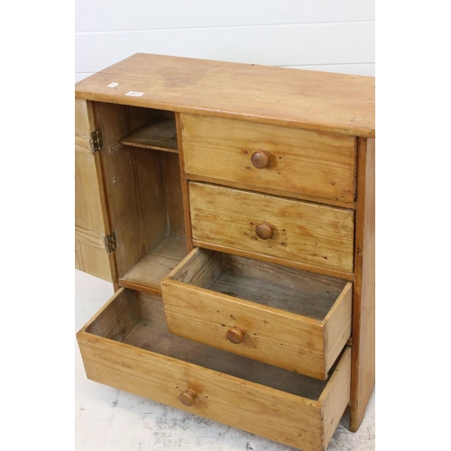 530 - A late Victorian pine unit of three short drawers and one long drawer with cupboard to the side.