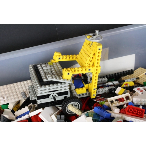 302 - Lego - Large Collection of various Lego pieces featuring bricks, wheels, booklets, etc