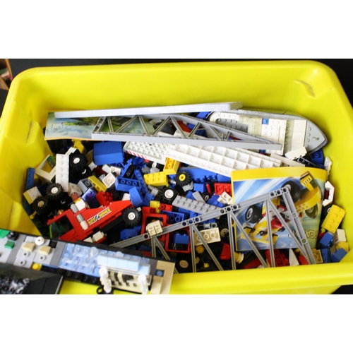 304 - Lego - Large Collection of various Lego pieces featuring bricks, wheels, booklets, etc (2 boxes)