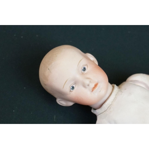 169 - Two early 20th C dolls to include Simon & Halbig bisque headed doll marked K R with star to back of ... 