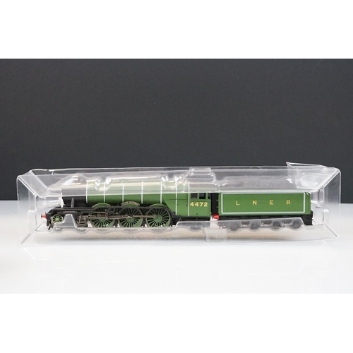 112 - Three Hornby OO gauge Flying Scotsman 4-6-2 LNER locomotives within custom plastic packaging