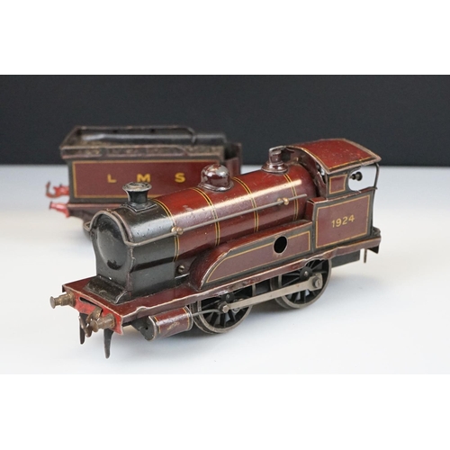 119 - Two Hornby O gauge locomotives to include 4-4-2 LMS 6954 in red and 0-4-0 1924 LMS in maroon with te... 