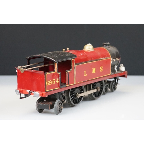 119 - Two Hornby O gauge locomotives to include 4-4-2 LMS 6954 in red and 0-4-0 1924 LMS in maroon with te... 