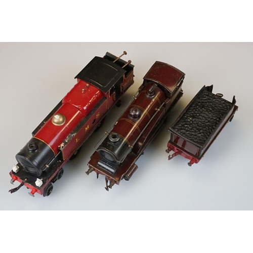 119 - Two Hornby O gauge locomotives to include 4-4-2 LMS 6954 in red and 0-4-0 1924 LMS in maroon with te... 