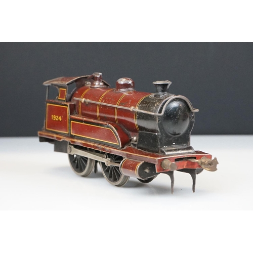 119 - Two Hornby O gauge locomotives to include 4-4-2 LMS 6954 in red and 0-4-0 1924 LMS in maroon with te... 