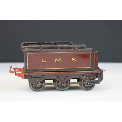 119 - Two Hornby O gauge locomotives to include 4-4-2 LMS 6954 in red and 0-4-0 1924 LMS in maroon with te... 