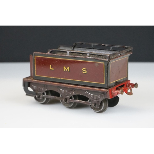 119 - Two Hornby O gauge locomotives to include 4-4-2 LMS 6954 in red and 0-4-0 1924 LMS in maroon with te... 