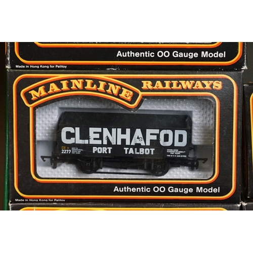 48 - 33 Boxed Palitoy Mainline OO gauge items of rolling stock to include wagons and vans featuring 37433... 