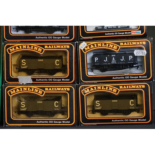 48 - 33 Boxed Palitoy Mainline OO gauge items of rolling stock to include wagons and vans featuring 37433... 