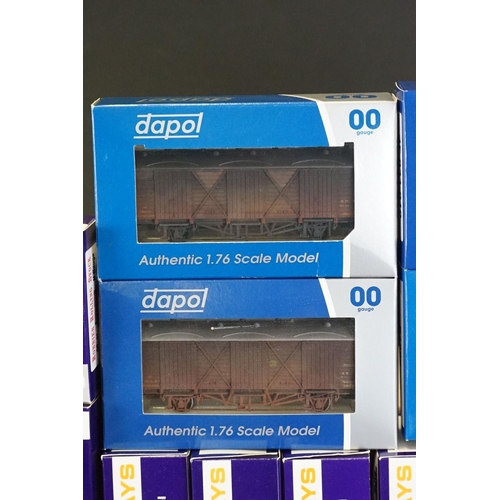 49 - 25 Boxed Dapol OO gauge items of rolling stock to include wagons, vans and tankers featuring 4F03101... 