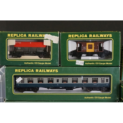 54 - 31 Boxed Replica Railways OO gauge items of rolling stock to include 12168 BR Blue Newspapers, 15001... 