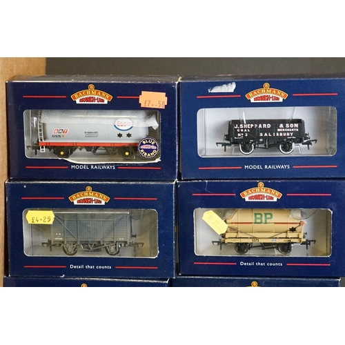 55 - 40 Boxed Bachmann OO gauge items of rolling stock to include wagons & vans featuring many Blue Riban... 