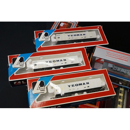 58 - 27 Boxed OO gauge items of rolling stock to include 9 x Lima, 7 x Oxford, 5 x Palitoy Mainline, 4 x ... 