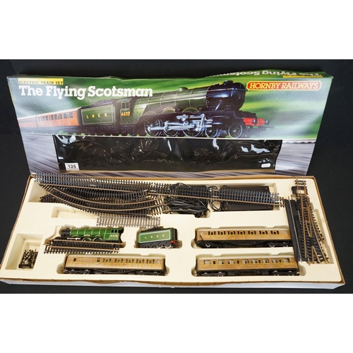 125 - Two boxed Hornby OO gauge electric train sets to include R778 The Flying Scotsman and RF851 Freight ... 