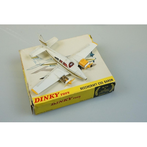 1048 - Four boxed Dinky diecast models to include 955 Fire Engine with Extending Ladder, 173 Pontiac Parisi... 