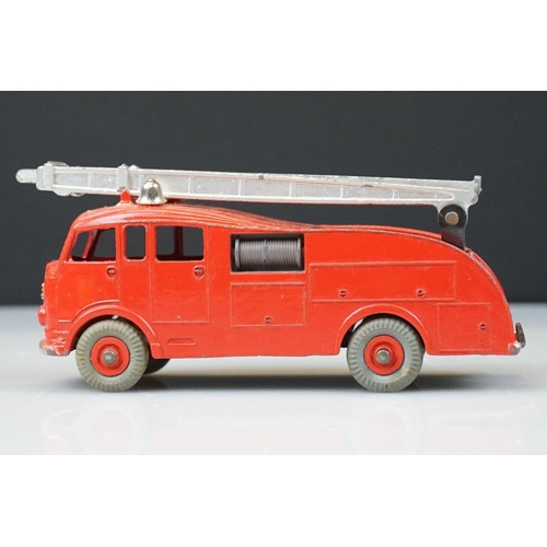 1048 - Four boxed Dinky diecast models to include 955 Fire Engine with Extending Ladder, 173 Pontiac Parisi... 