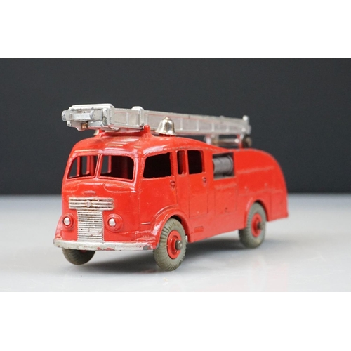 1048 - Four boxed Dinky diecast models to include 955 Fire Engine with Extending Ladder, 173 Pontiac Parisi... 