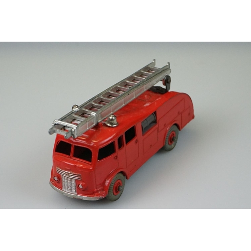 1048 - Four boxed Dinky diecast models to include 955 Fire Engine with Extending Ladder, 173 Pontiac Parisi... 