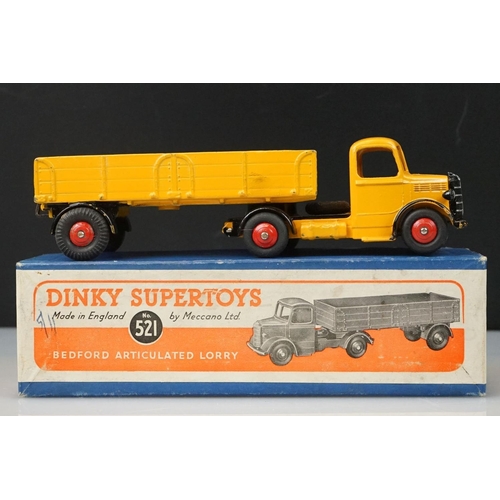 1056 - Two boxed Dinky Supertoys diecast models to include 521 Bedford Articulated Lorry in yellow with red... 