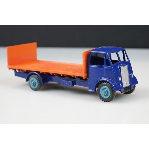 1056 - Two boxed Dinky Supertoys diecast models to include 521 Bedford Articulated Lorry in yellow with red... 