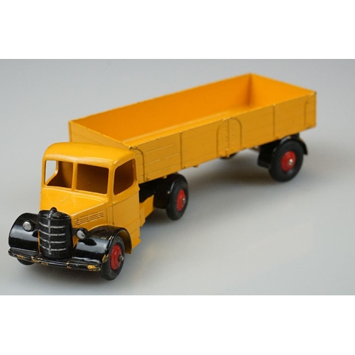 1056 - Two boxed Dinky Supertoys diecast models to include 521 Bedford Articulated Lorry in yellow with red... 