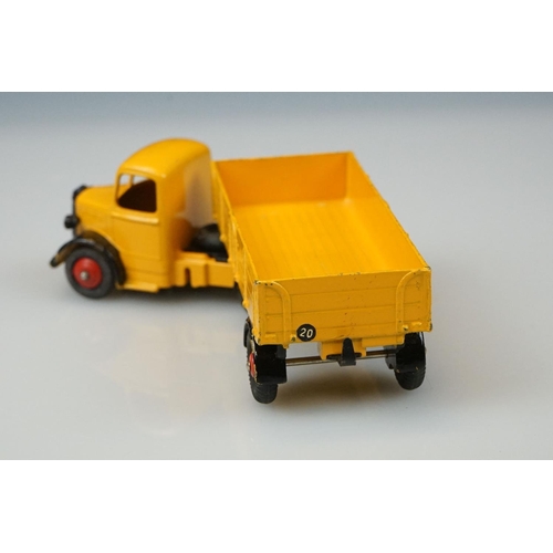 1056 - Two boxed Dinky Supertoys diecast models to include 521 Bedford Articulated Lorry in yellow with red... 