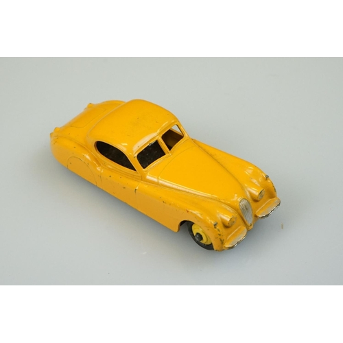 1058 - Four boxed Dinky diecast models to include 157 Jaguar XK120 Coupe in yellow, 185 Alfa Romeo 1900 Sup... 