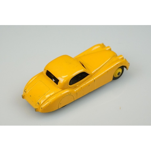 1058 - Four boxed Dinky diecast models to include 157 Jaguar XK120 Coupe in yellow, 185 Alfa Romeo 1900 Sup... 