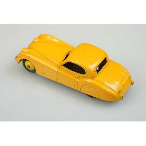 1058 - Four boxed Dinky diecast models to include 157 Jaguar XK120 Coupe in yellow, 185 Alfa Romeo 1900 Sup... 