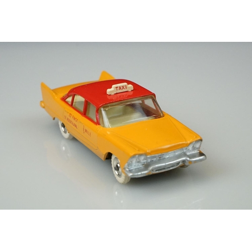 1059 - Two boxed Dinky diecast models to include 265 Plymouth USA Taxi & 283 BOAC Coach, diecast vg with so... 