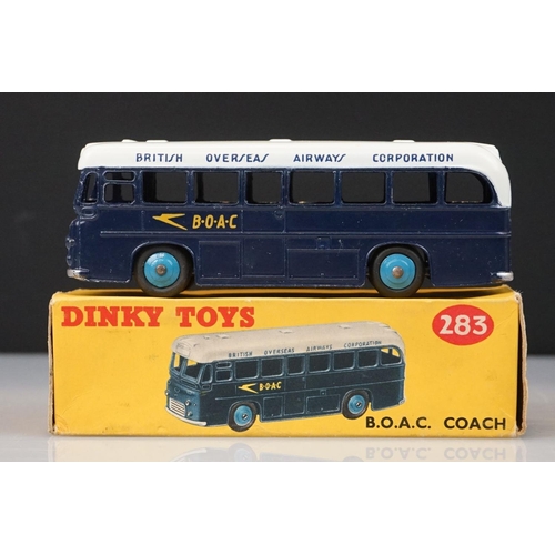 1059 - Two boxed Dinky diecast models to include 265 Plymouth USA Taxi & 283 BOAC Coach, diecast vg with so... 