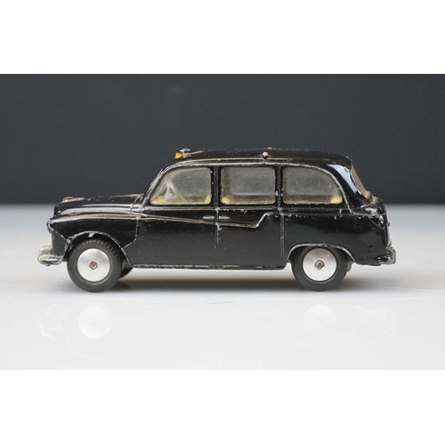 1059 - Two boxed Dinky diecast models to include 265 Plymouth USA Taxi & 283 BOAC Coach, diecast vg with so... 