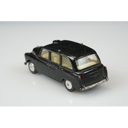 1059 - Two boxed Dinky diecast models to include 265 Plymouth USA Taxi & 283 BOAC Coach, diecast vg with so... 