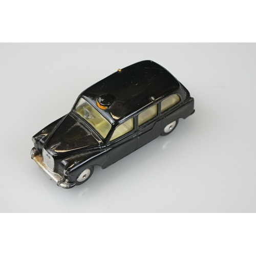 1059 - Two boxed Dinky diecast models to include 265 Plymouth USA Taxi & 283 BOAC Coach, diecast vg with so... 