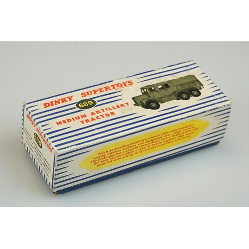 1060 - Two boxed Dinky Supertoys military diecast models to include 660 Tank Transporter and 689 Medium Art... 