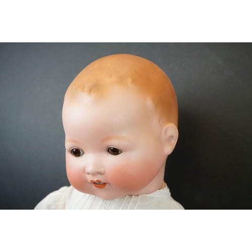 187 - Early 20th C Armand Marseille baby doll, bisque head, bottom teeth, sleeping glass eyes, original dr... 