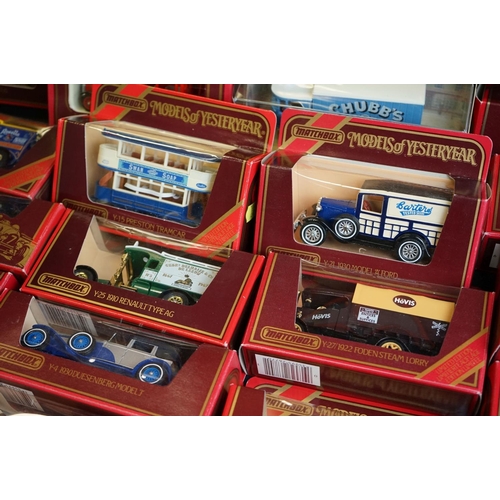 1145 - Around 69 boxed Matchbox Models of Yesteryear diecast models in red boxes, ex