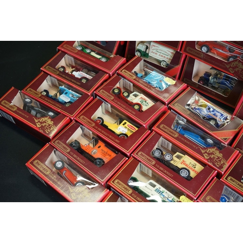 1145 - Around 69 boxed Matchbox Models of Yesteryear diecast models in red boxes, ex